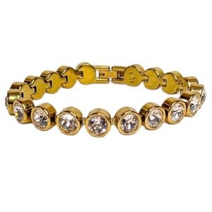 Golden bronze tone stainless steel clasp bracelet with sparkling jewel details